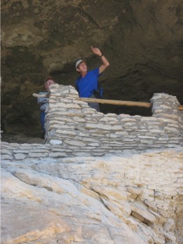 Dr. Robert Hard discussing the site with a National Park Service volunteer