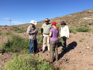 John Roney explaining the ins and outs of using a GPS (From Left to Right: John Roney, Overton Lesley, Gabriella Zaragosa, and Megan Brown)